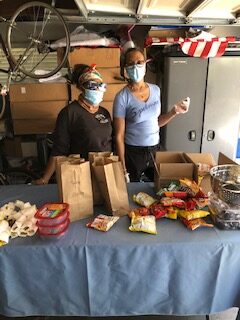 SpeLA volunteers packing donations